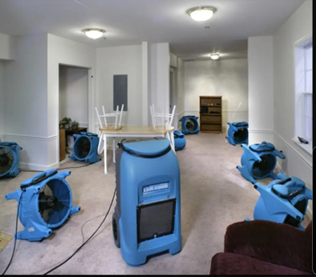 Air movers and dehumidifier setup for Water Damage Restoration in Berwyn